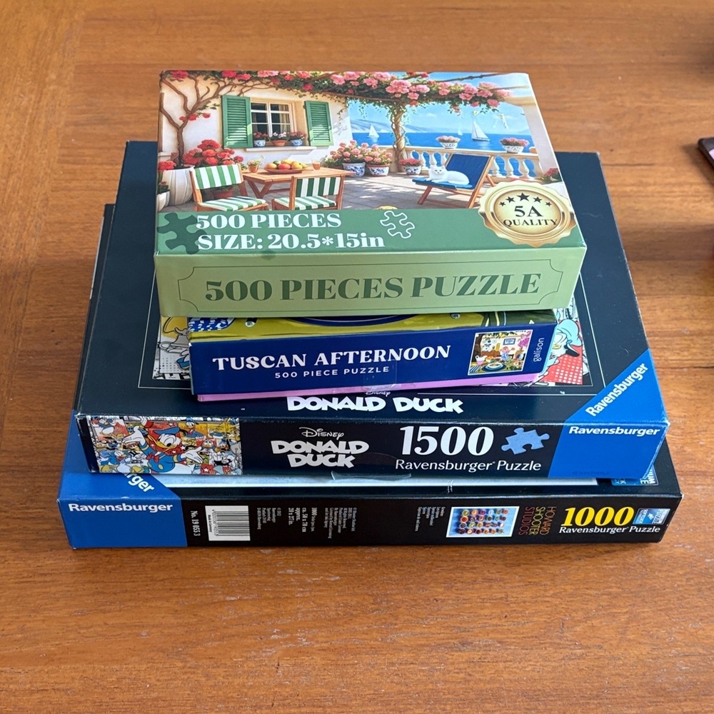 Preowned lot (4) complete puzzles